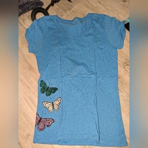 blue shirt with glitter butterflies